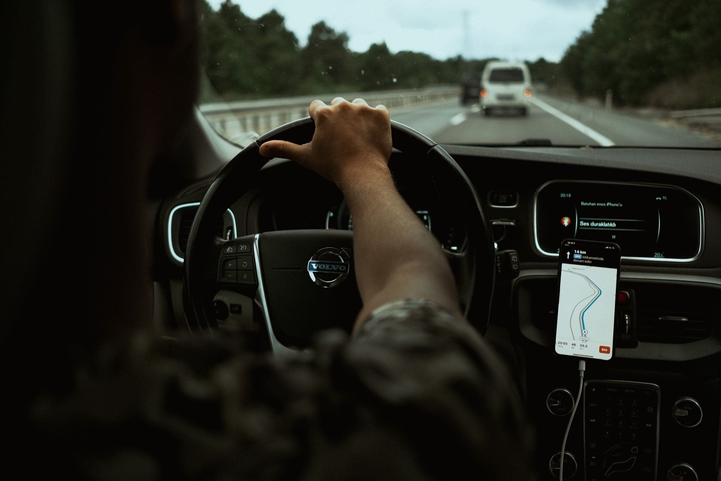 ADAS calibration in Billings: driver on the highway with the lane camera area behind the windshield